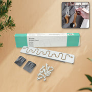 White adjustable wall hook with a movable sliding mechanism.