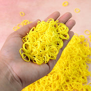 Close-up view of premium elastic rubber bands showing strong stretch