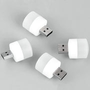 Portable USB bulb connected to a power bank, ready for emergency light situations.