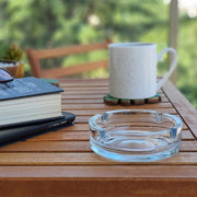 Close-up of the smooth, polished finish of the crystal glass ashtray.