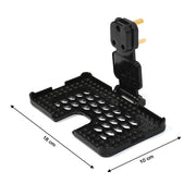 Wall-mounted PHOBIA black phone charging holder in use, keeping the device safe.