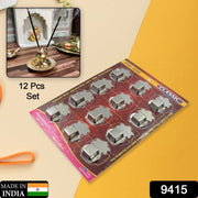 Close-up of the self-adhesive backing on a stainless steel agarbatti holder.