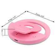 Detailed view of the LED bulbs on the selfie ring light for optimal illumination.