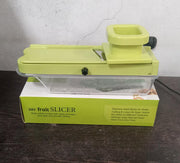 Kitchen scene featuring the efficient Quickslice vegetable and fruit cutter.