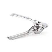 Compact and easy-to-store stainless steel lemon squeezer displayed in a kitchen.
