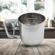 Top-down view of the manual flour sifter, ready for sifting various flours.