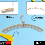 Compact folding clothes hanger ideal for travel and small spaces.