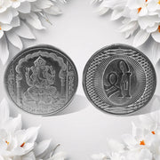 Hand holding the auspicious Decorative Ganesh Coin, ready for pooja or gifting.