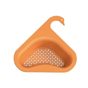 Close-up of the Swan Drain Strainer securely installed in a modern kitchen sink.