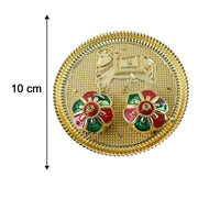 Golden pooja thali with cow motif for tilak and rituals