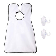 Man using a black beard apron with suction cups to catch hair clippings while shaving.