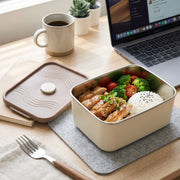 Thermal food carrier lunch bag open, revealing stackable, BPA-free plastic containers.